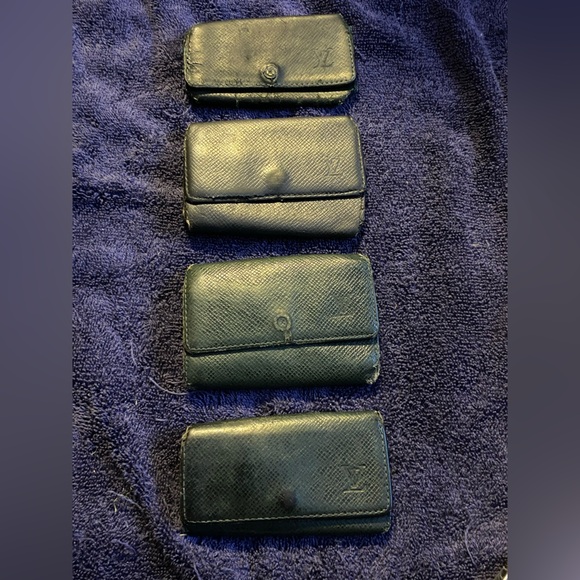 Lot of 4 Louis Vuitton Tiaga leather keychain wallets